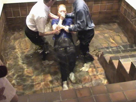 Pat being baptised